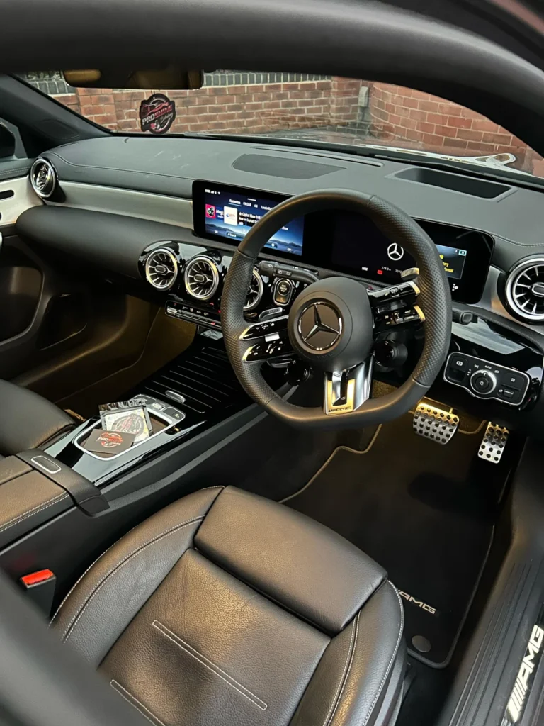 Mercedes-AMG cabin with black leather and metallic vents