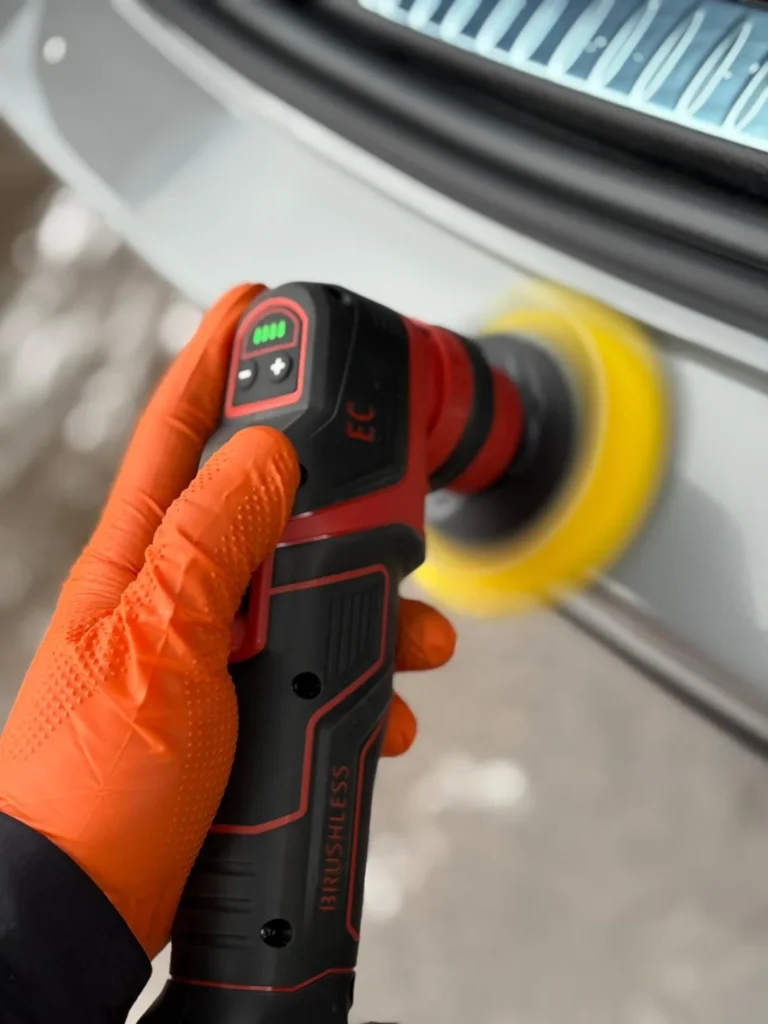 Machine polishing silver vehicle paintwork
